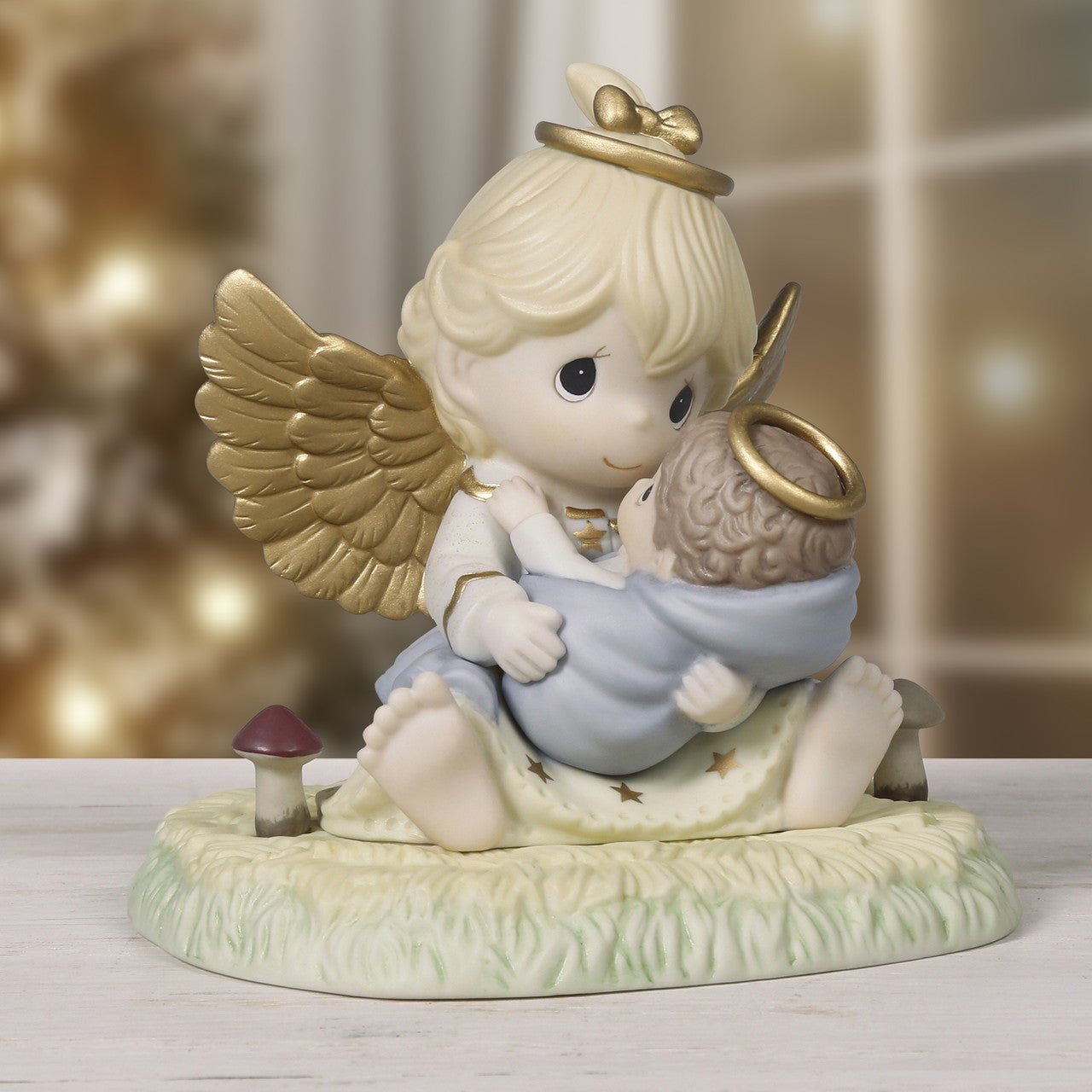 Angel Holding Baby Jesus Figurine